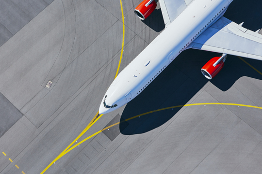 jet airplane taxiing to an airport runway before takeoff